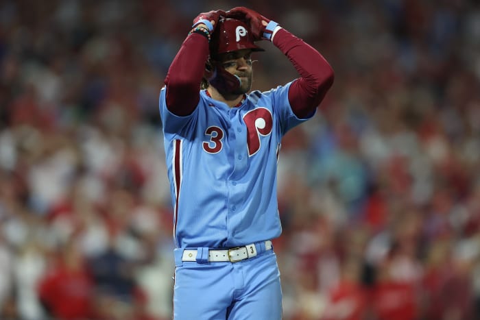 Oct 12, 2023; Philadelphia, Pennsylvania, USA; Philadelphia Phillies first baseman Bryce Harper (3) reacts after flying out against the Atlanta Braves during the seventh inning during game four of the NLDS for the 2023 MLB playoffs at Citizens Bank Park.